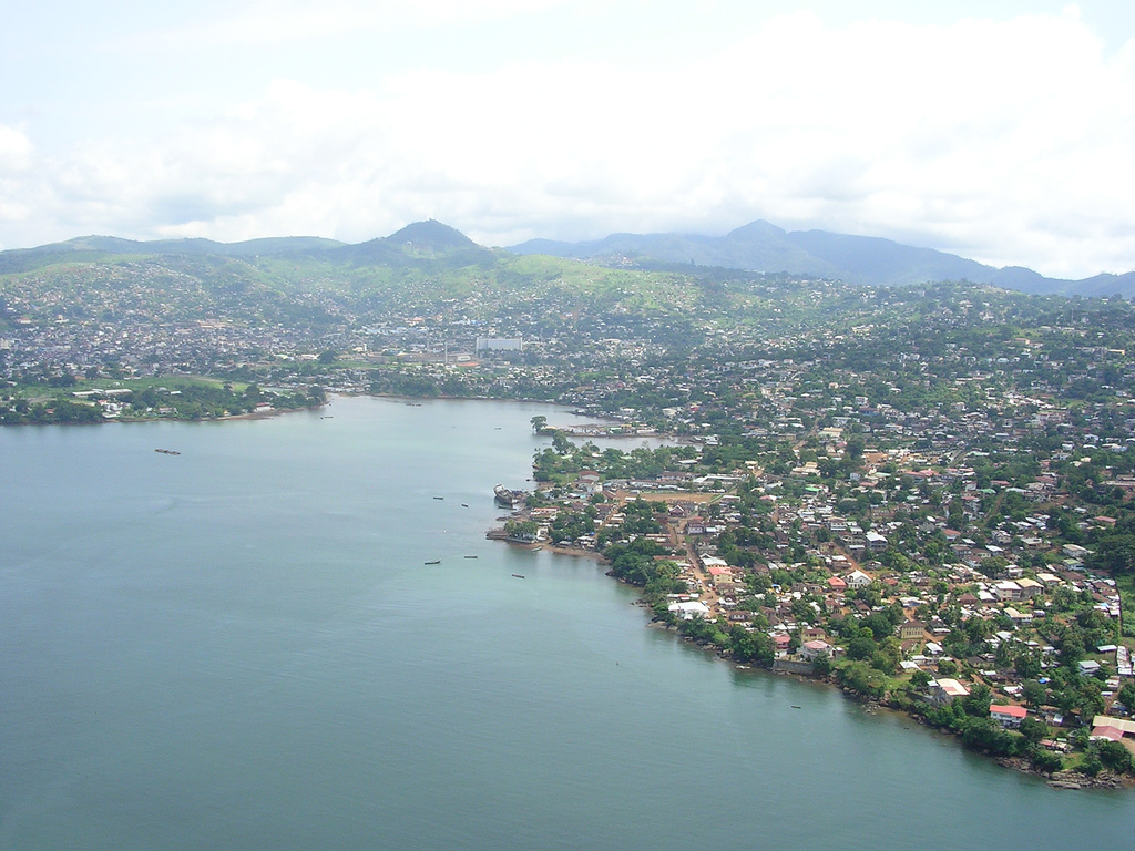 "Freetown-aerialview" by David Hond - Freetown From the Air. Licensed under Creative Commons Attribution 2.0 via Wikimedia Commons - http://commons.wikimedia.org/wiki/File:Freetown-aerialview.jpg#mediaviewer/File:Freetown-aerialview.jpg